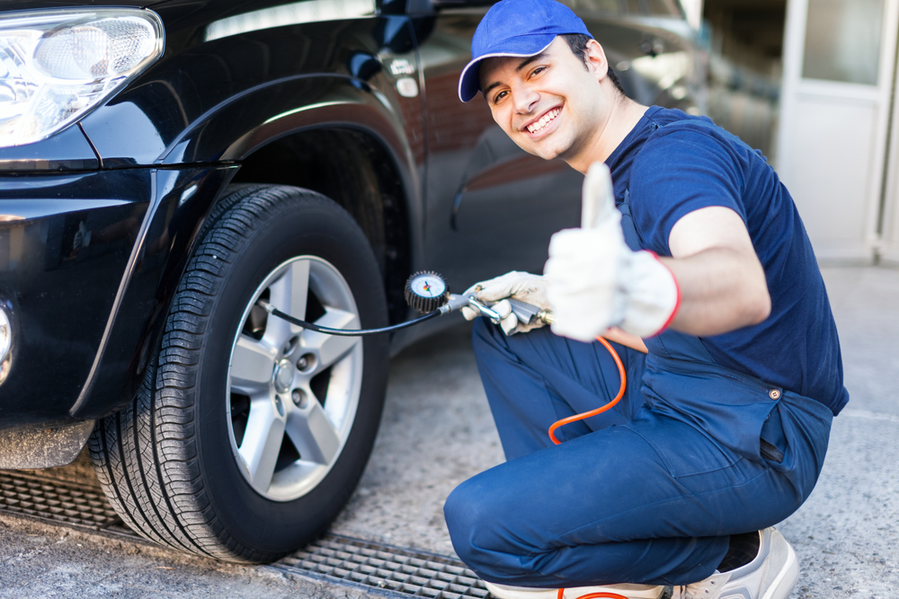 A person fixing a car

Description automatically generated with medium confidence