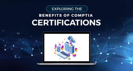 IT certification materials on a laptop surrounded by tech books and notes
